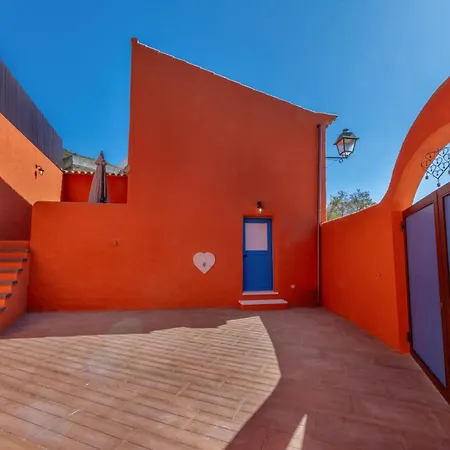 Com Casa de Férias *